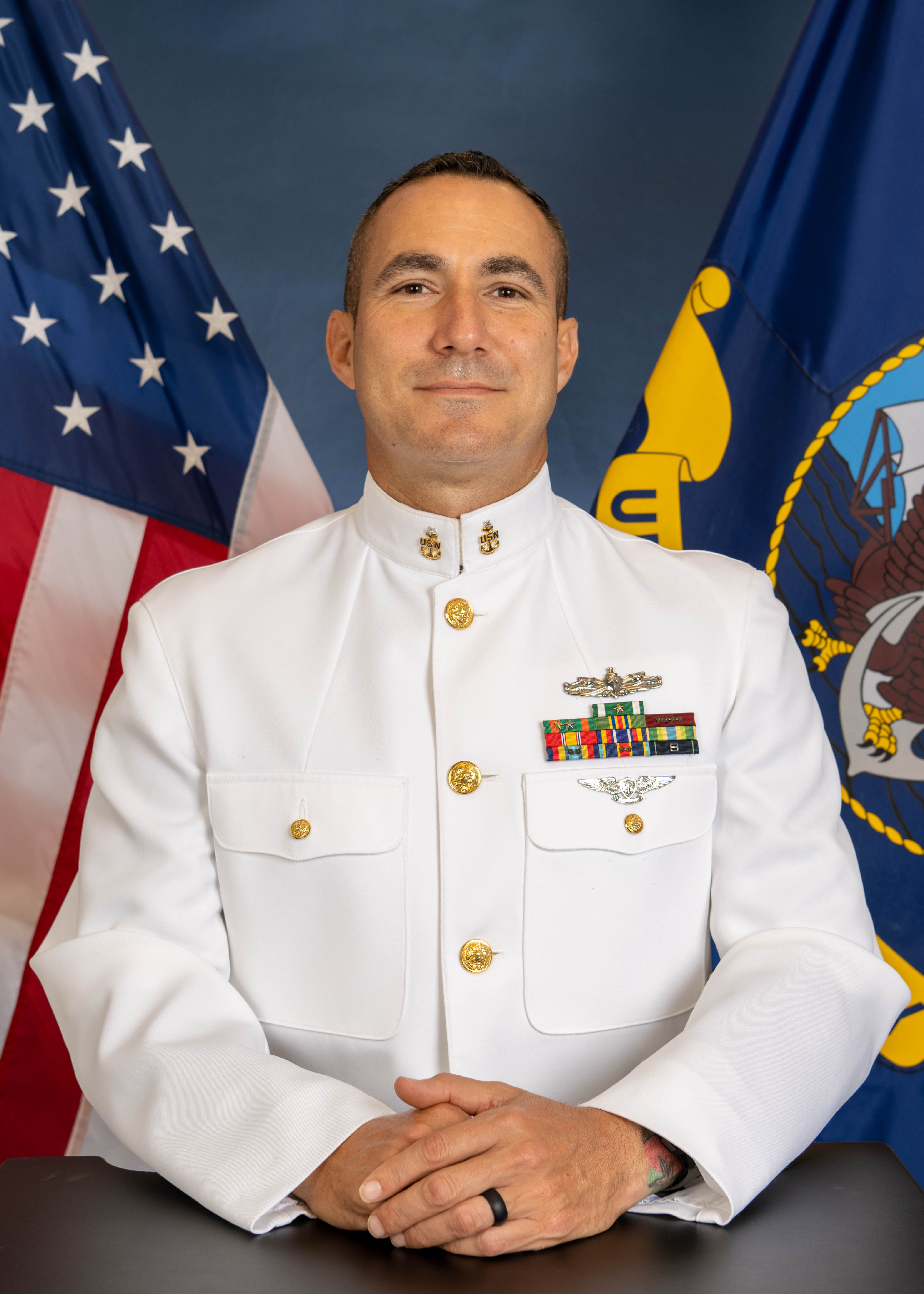 Official photo of MUCS Glenn, assistant director