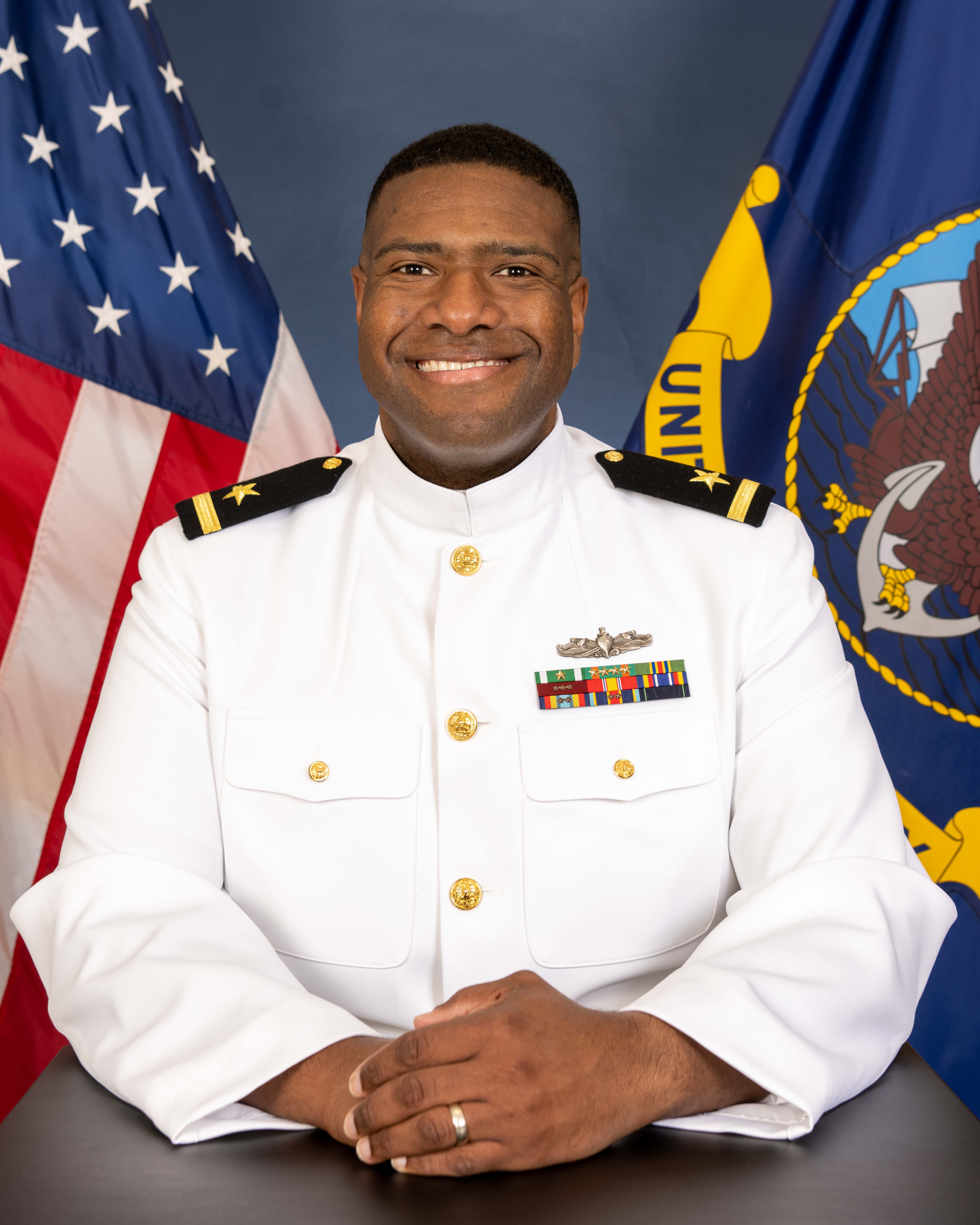 Official photo of Ensign Britt, assistant director