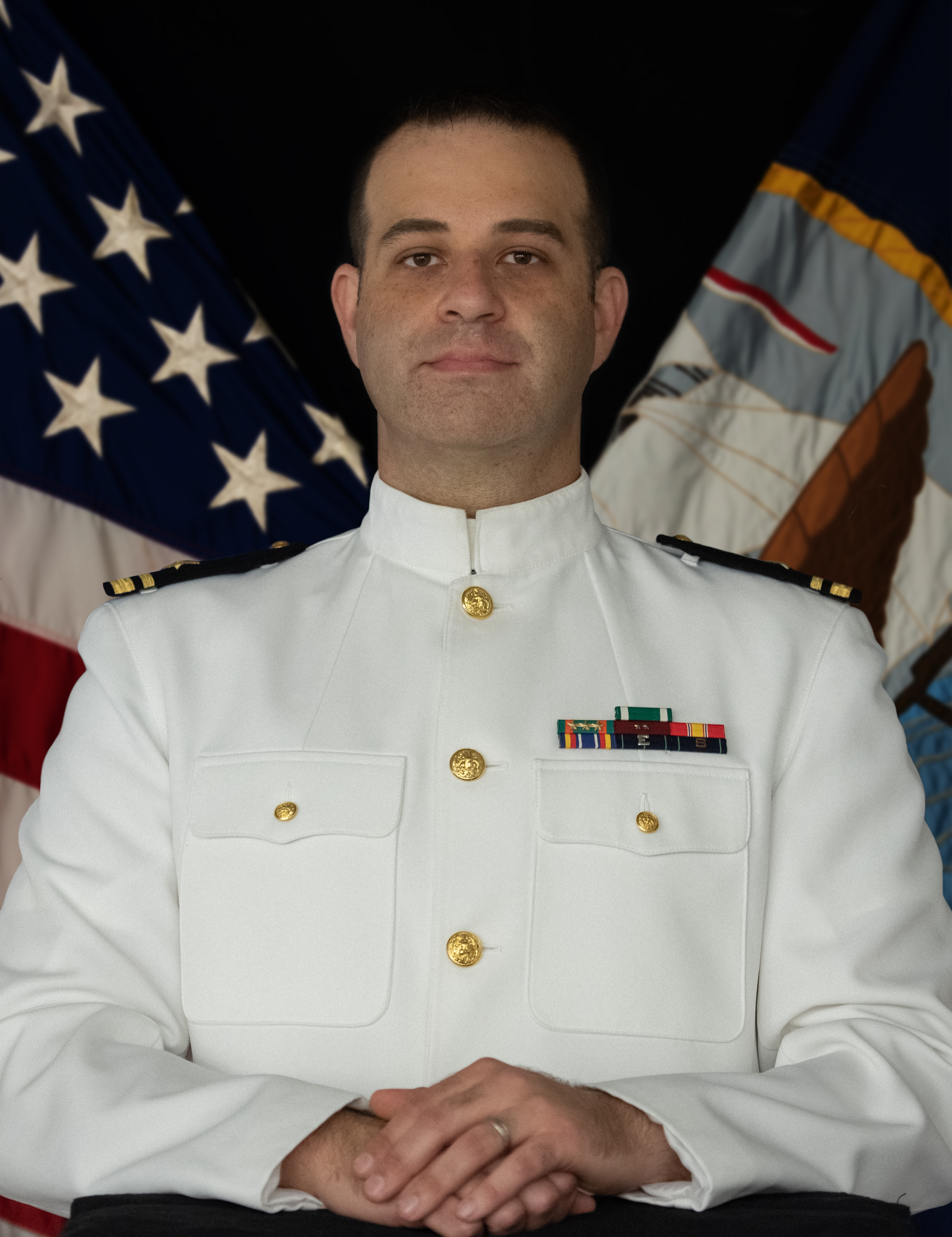 Official photo of Lt. j.g. Harbuziuk, assistant fleet bandmaster.